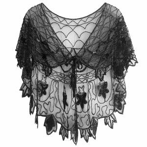 Détail du châle en tulle noir à paillettes avec broderie vintage et fermeture à nouer