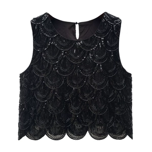 Elegant sleeveless black cropped top with layered sequin and bead embroidery details