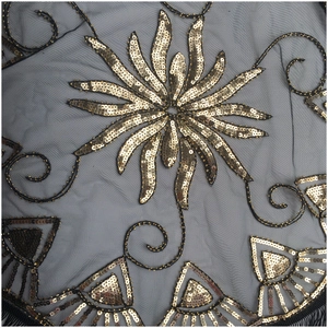 Elegant black mesh shawl with gold sequin floral patterns and decorative art deco embroidery