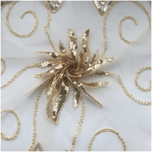 Elegant evening wrap with golden sequins and bead embroidery on white mesh fabric