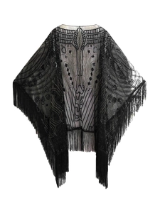 Detail of 1920s Gatsby shawl featuring black sequins, mesh fabric and long fringe trim
