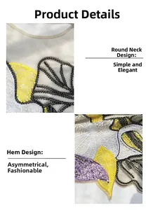 Close-up of sparkling sequin floral embroidery on sheer mesh top with irregular hemline