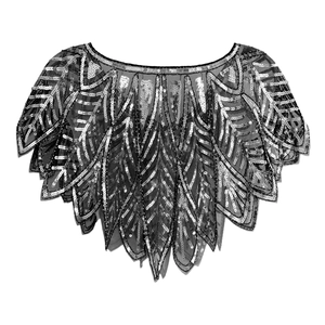 Detail of 1920s Gatsby style black mesh shawl with silver sequins and scalloped edges