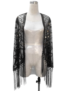 Detail showing black sequins and mesh patterns with fringe on a 1920s vintage shawl