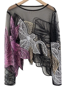 Detail of heavy beadwork and sequins on sheer black mesh long sleeve top