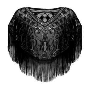 Detail of 1920s Gatsby style black sequin embroidery on mesh with long fringe