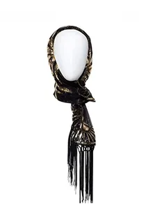 Detail of a vintage 1920s style black headscarf with gold sequins and long silk tassels