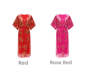 Detailed view of red and rose red V-neck sequin embroidered evening gowns on white background