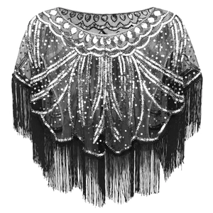 Detailed view of black vintage shawl featuring silver sequins and long fringe edges