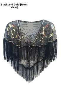 Détail du châle vintage en tulle noir avec paillettes dorées et longues franges