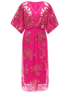 Close-up of rose red V-neck dress with intricate floral embroidery and shimmering sequins