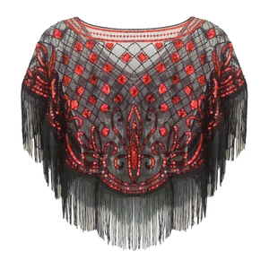 Close-up of red sequins and black fringe detail on a 1920s vintage mesh capelet