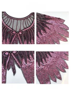 Detail view of pink sequins on black mesh with Ruyi button and irregular hemline