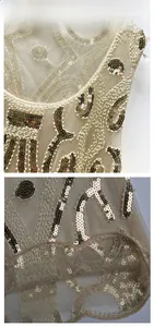 Detail of champagne sequin mesh tank top with intricate geometric embroidery patterns