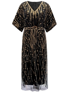 1920s vintage evening dress in black with gold sequins and V-neck mesh design