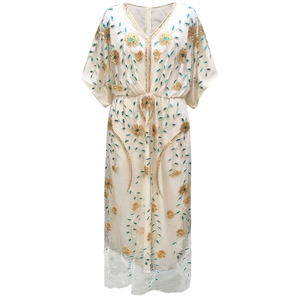 Elegant white V-neck Abaya maxi dress with gold sequins and embroidery detail