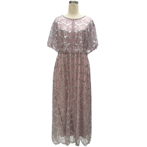 Pink tulle evening gown with silver sequins and a sheer capelet overlay