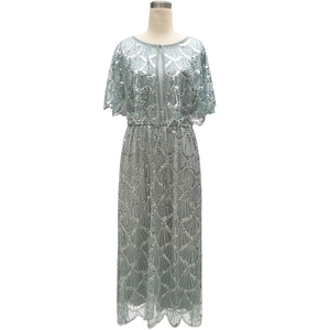 Elegant mint blue sequined evening dress with cape sleeves and shell embroidery pattern