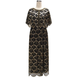 Elegant Gatsby-style long dress with golden sequins and scalloped patterns on black mesh