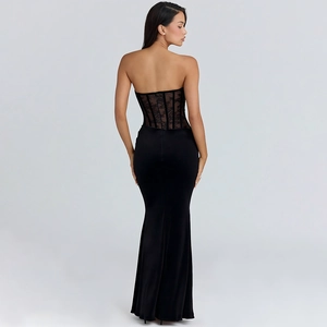 Detail of backless black lace corset bodice on fitted fishtail evening maxi dress