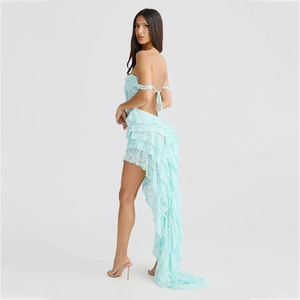 Detail view of lace strapless high-low dress with layered ruffles and backless design
