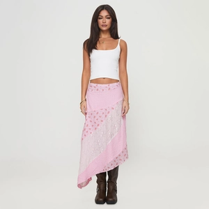 Summer irregular polka dot sheer skirt paired with a white crop top and boots