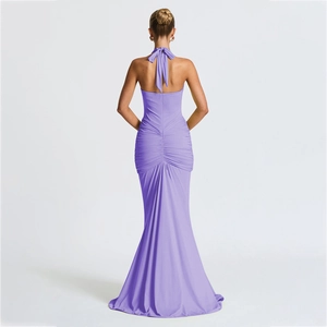 Detail of the backless lavender halter dress showing pleated waist and fishtail hemline