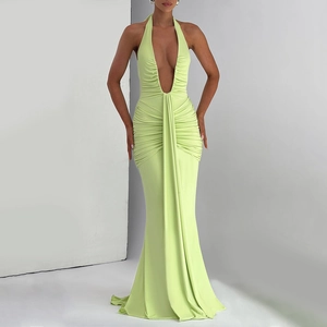 Elegant lime green halter neck maxi dress with deep V-neck and ruched details for summer