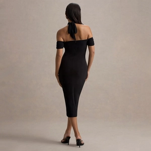 Elegante abito midi nero senza schienale con scollo all'americana e zip