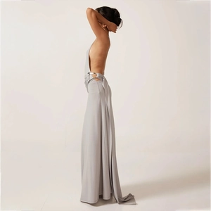 Detailed side view of light gray backless maxi dress with side metal ring detail