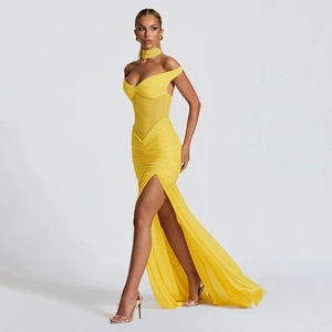 Elegant bright yellow strapless evening gown with mesh stitching and a high side slit detail