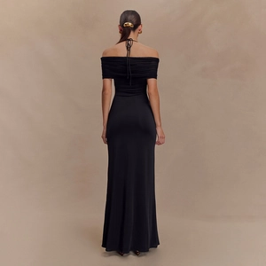 Elegant black off-the-shoulder mesh maxi dress with halter neck and ruching detail
