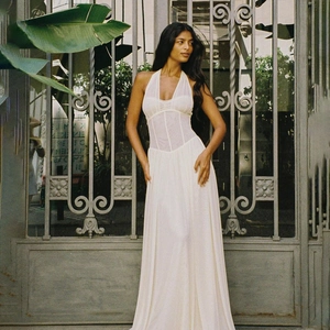 Elegant ivory halter neck corset maxi dress with pleated waist for formal summer events