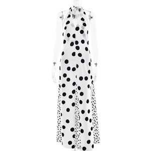 Deep V-neck backless maxi dress with classic polka dot pattern for elegant summer fashion