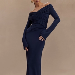 Detailed view of elegant navy long sleeve dress with ruched waist and off-shoulder neckline