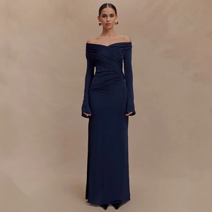 Detail of elegant off-shoulder navy blue dress with criss-cross pleats and bodycon silhouette