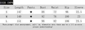 Detailed size chart for French polka dot maxi dress showing length bust and waist measurements
