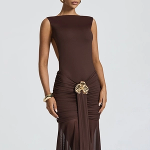 Dark brown sleeveless slim-fit maxi dress featuring a gold 3D flower buckle and ruched detail