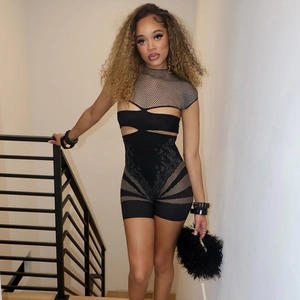 Detail of sexy black cutout bodysuit with mesh splicing and high elasticity fabric