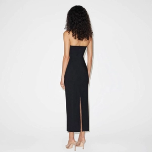 Slim fit black tube maxi dress with a stylish back slit for a modern silhouette