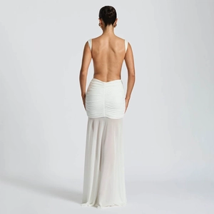 Elegant white backless maxi dress with ruched detail and semi-sheer chiffon panels