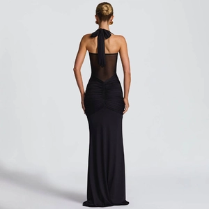 Elegant black halter neck maxi dress with sheer mesh back and ribbon bow tie detail