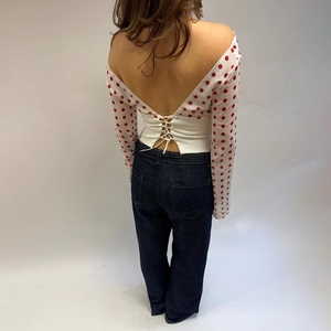 Chic backless polka dot chiffon top with deep V-cut and lace-up corset style details