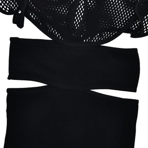 Detail of black mesh patchwork bodysuit with sexy cut-out design and high elastic fabric