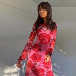 Elegant long sleeve bodycon maxi dress with vibrant red rose print on pink fabric