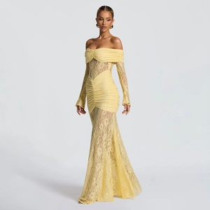 Detailed lace stitching and off-shoulder design on an elegant pale yellow maxi dress