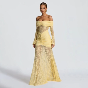 Detail of light yellow lace dress featuring off-shoulder neckline and ruched bodice detail