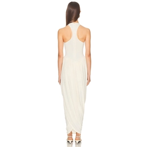 Close-up of the racerback design and invisible zipper detail on the cream maxi dress