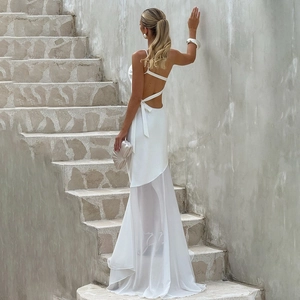 Elegant white backless evening dress with fishtail tulle hem and cross-tie detail