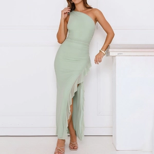 Close-up of light green ruched one-shoulder dress with ruffle detail and high side slit